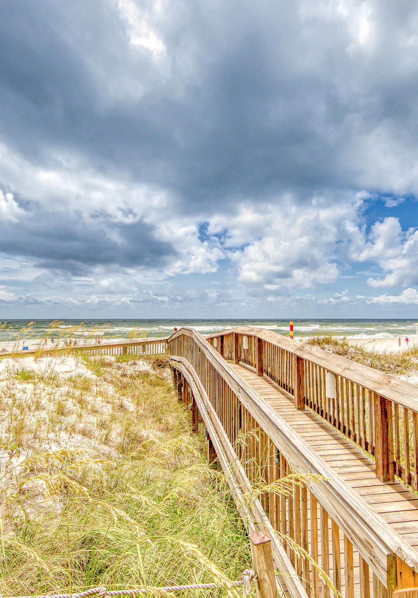 Gulf-view condo with central AC, WiFi, laundry, pools, gym & tennis