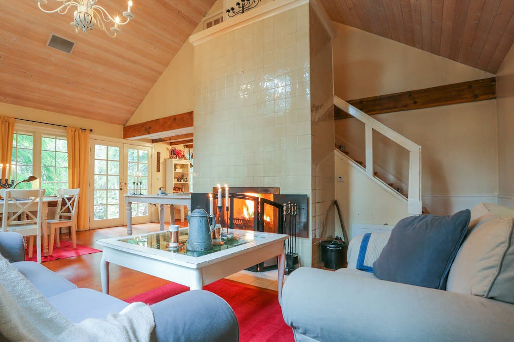Waterfront lodge on 24 acres with patio & fireplace