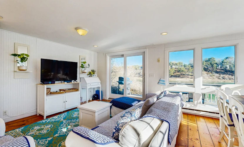 Breathtaking Riverfront Home with a Lovely Deck, Close to Beach - Dogs OK