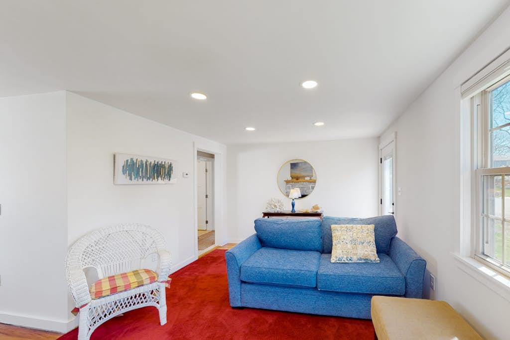 Renovated cottage steps from private beach with backyard, grill, bay views, AC