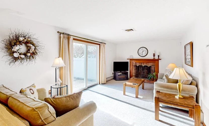 Single-story home with fenced yard, deck & great location near town/beaches