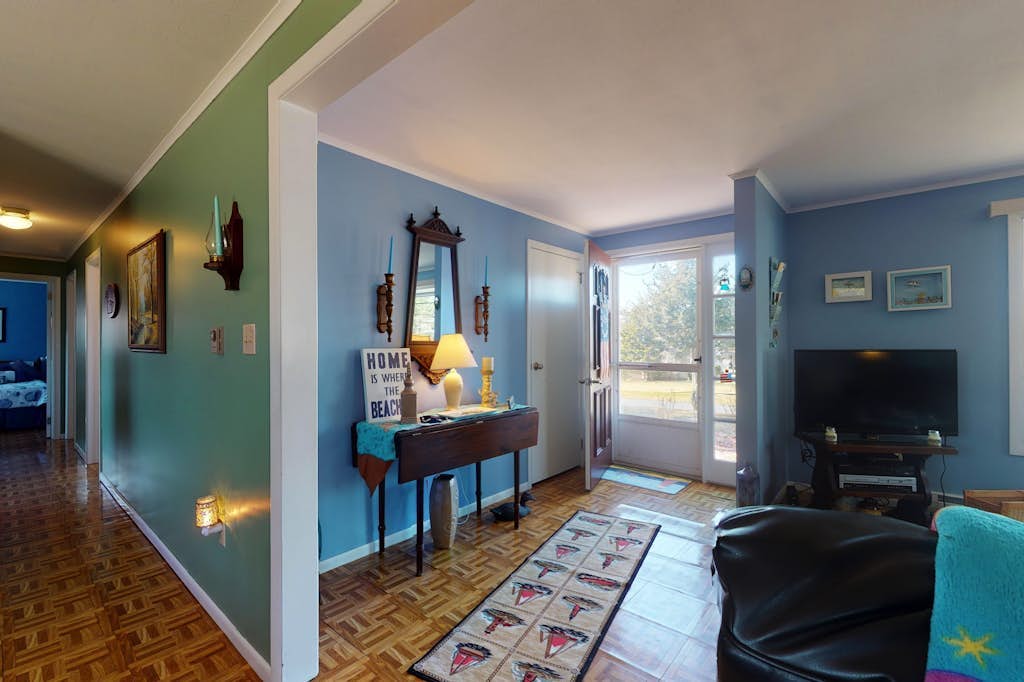 Bright & nautical beach home with enclosed yard & outdoor shower - walk to beach