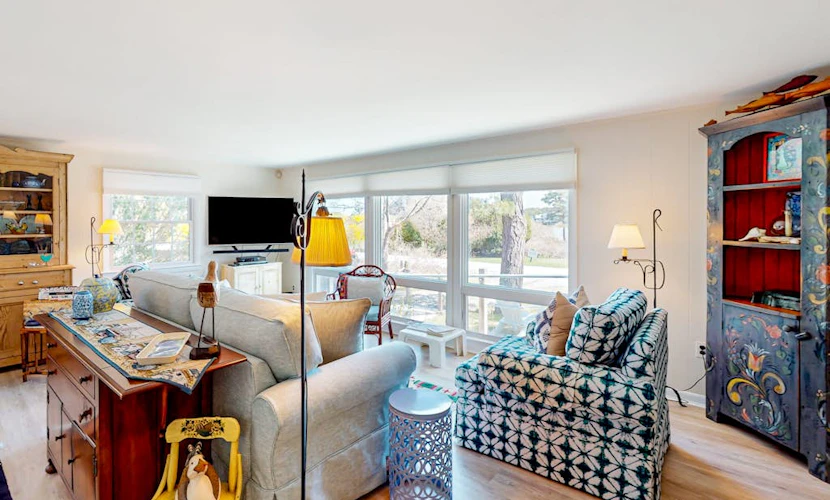 Water-view house near golf with firepit, grill, deck, central AC & washer/dryer