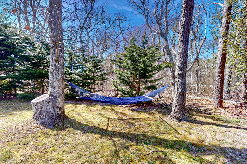 Water-view house near golf with firepit, grill, deck, central AC & washer/dryer