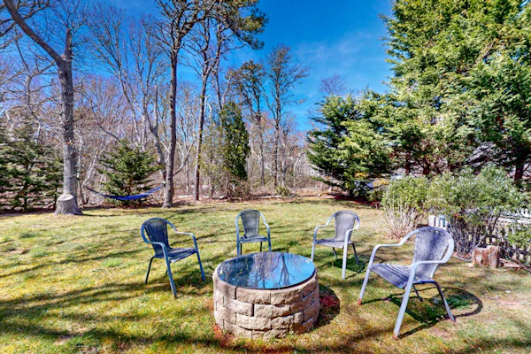 Water-view house near golf with firepit, grill, deck, central AC & washer/dryer