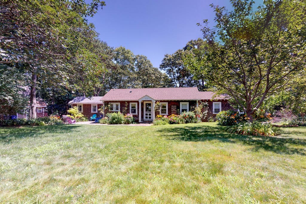 Adorable waterfront home w/ boat access & a three-season sunroom