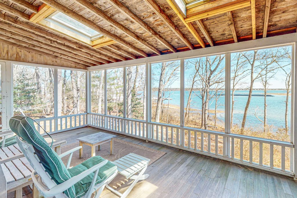 Adorable waterfront home w/ boat access & a three-season sunroom