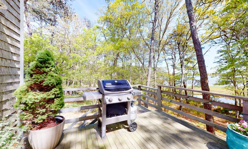 Waterfront escape with gas grill, furnished deck, fast WiFi, beach access nearby
