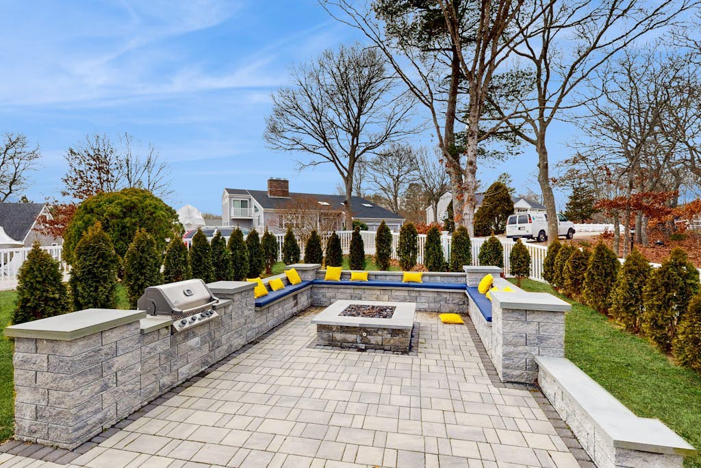 Waterfront home with firepit, grill, open layout, smart TVs, deck, W/D, & AC