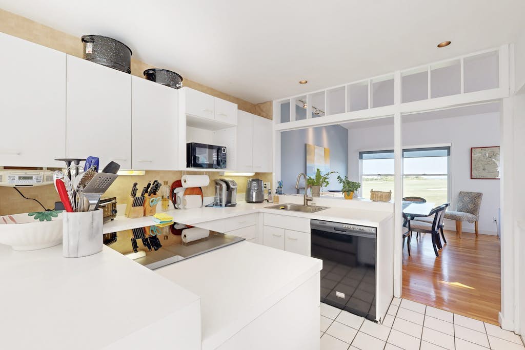 Spacious home on golf course with 4 outdoor spaces overlooking the Sound