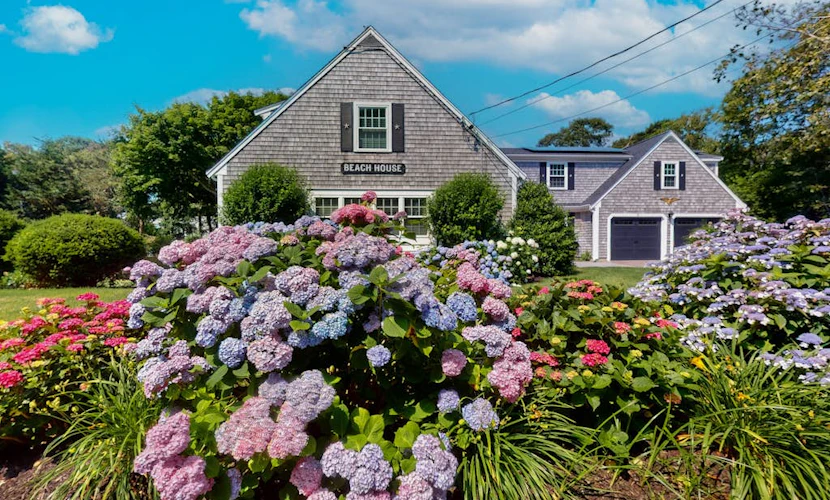 Elegant estate with large deck and lush yard - walk to beach on Nantucket Sound