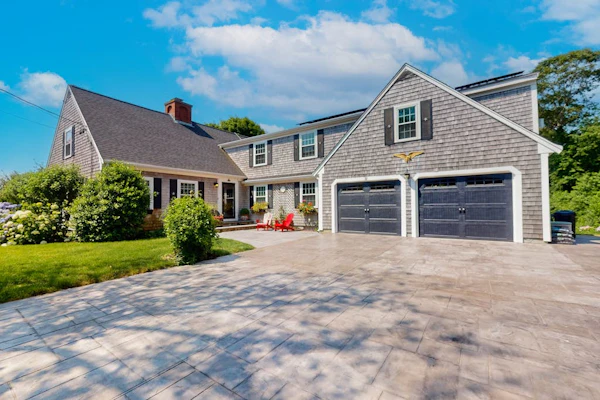 Elegant estate with large deck and lush yard - walk to beach on Nantucket Sound