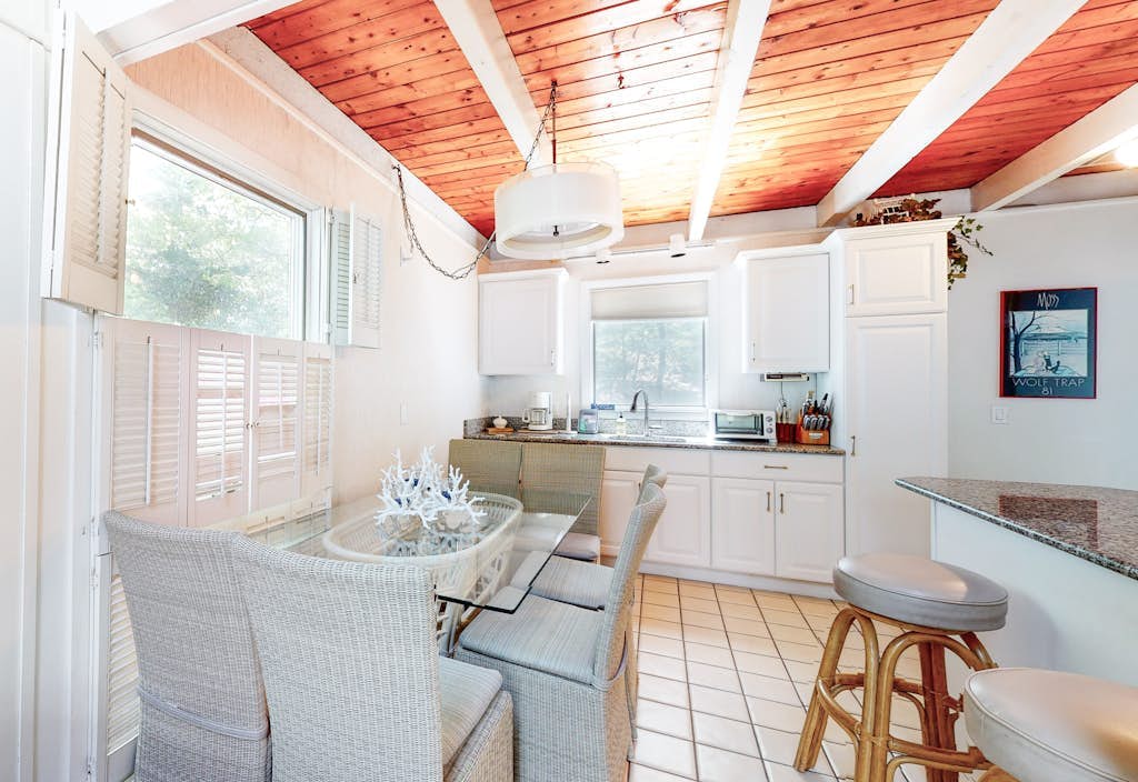 Summer home with expansive deck & wonderful location for beachgoers