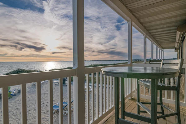 Oceanfront suite with bay-view balcony, full kitchen, AC & firepit
