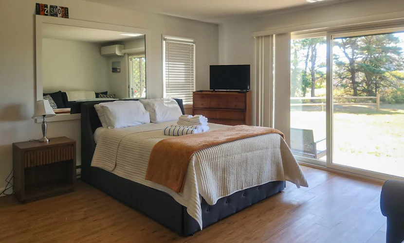 Cozy, Ground-Floor Getaway w/ Free WiFi, a Kitchen, Shared Pool, & Private Patio
