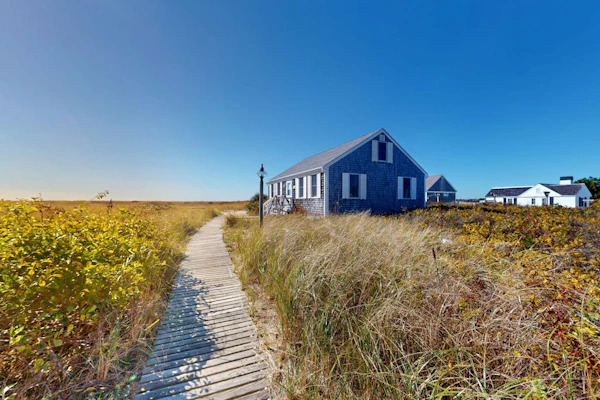 Cozy cottage steps to the beach with patio, W/D, & partial AC