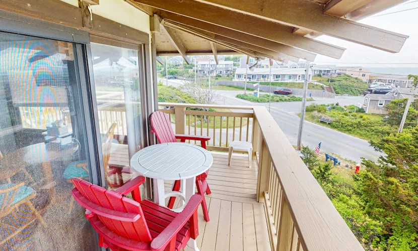 Cozy studio condo with bay views, deck, and beach steps away