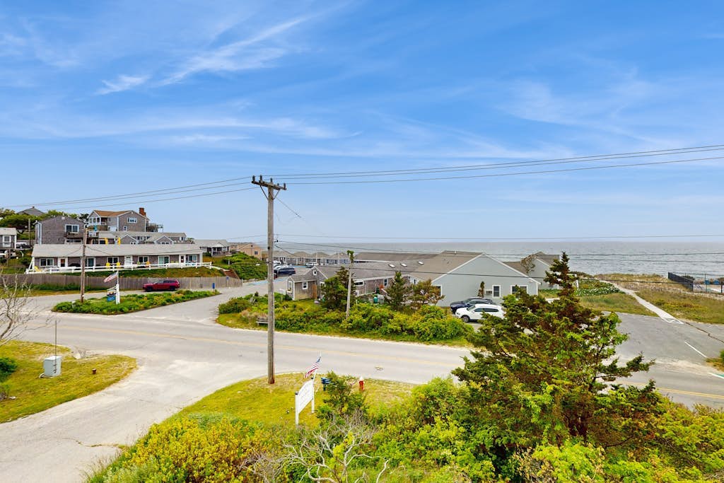 Cozy studio condo with bay views, deck, and beach steps away