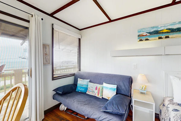Cozy studio condo with bay views, deck, and beach steps away