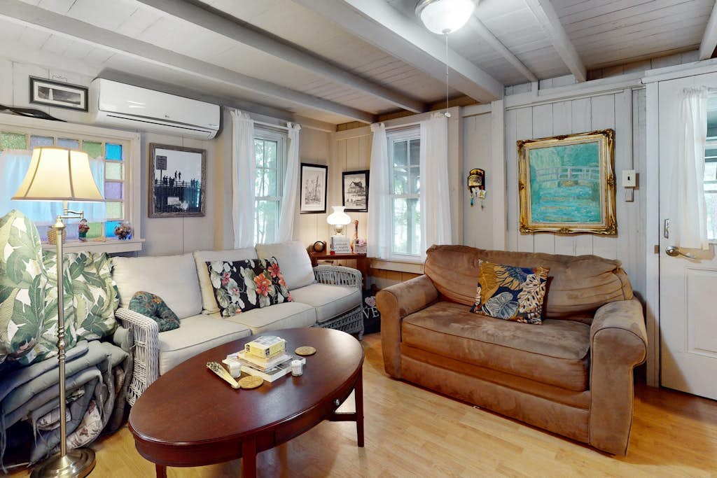 Spacious colonial home close to town with AC, porches, & W/D