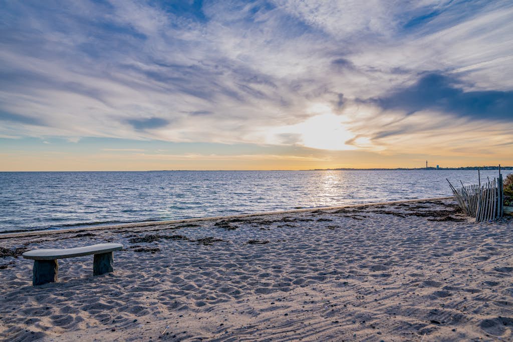 Oceanfront cottage near town with full kitchen, AC, beach access & patio