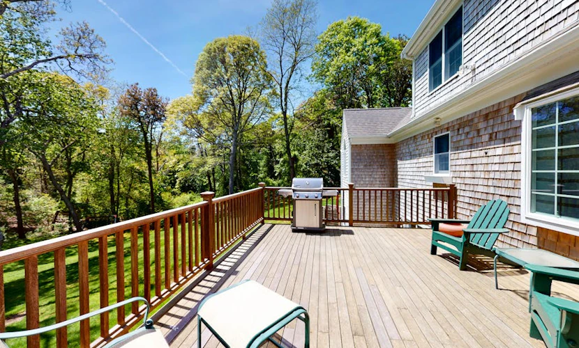 Spacious home with huge deck & tree-lined yard, grill, & WiFi - great location