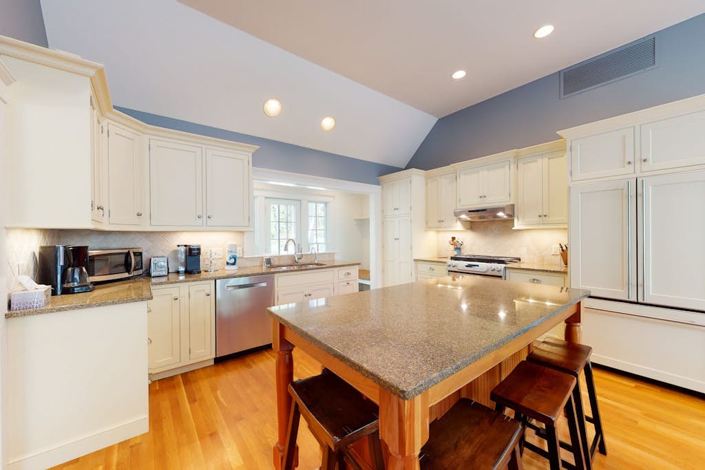 Spacious home with huge deck & tree-lined yard, grill, & WiFi - great location