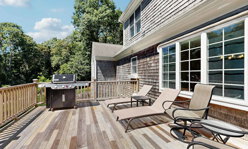 Spacious home with huge deck & tree-lined yard, grill, & WiFi - great location