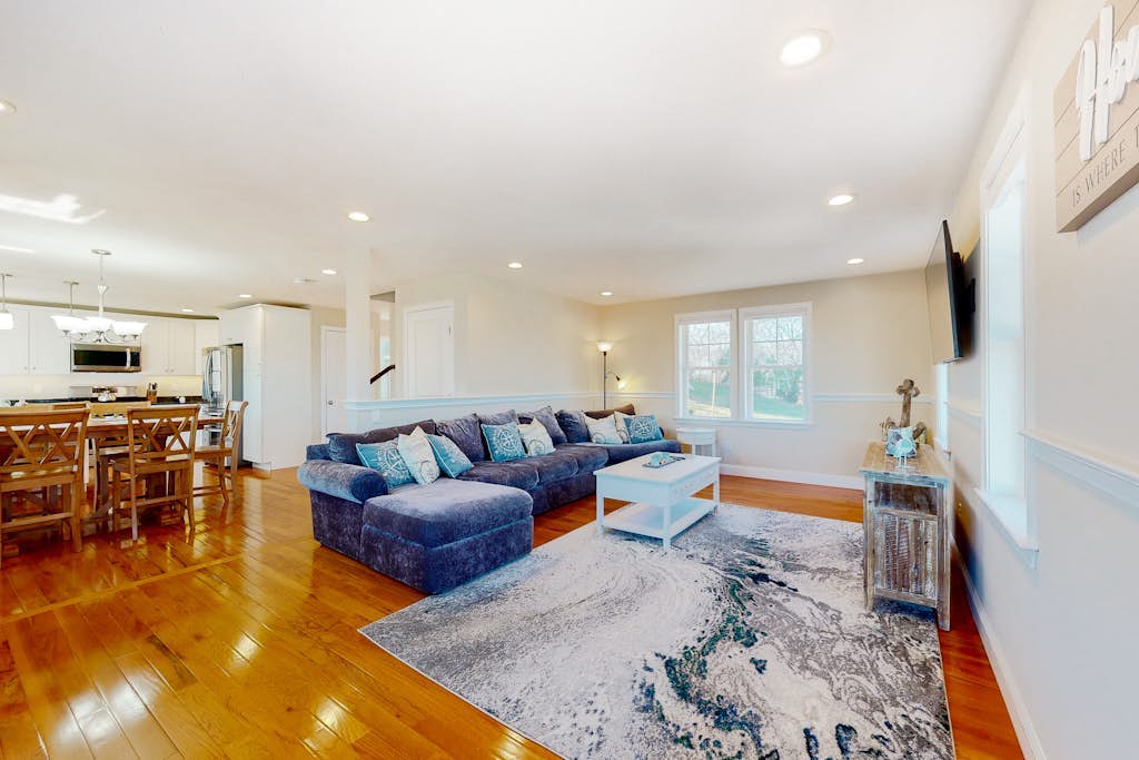 Comfortable home with rooftop deck, beach & water views, W/D, & central AC