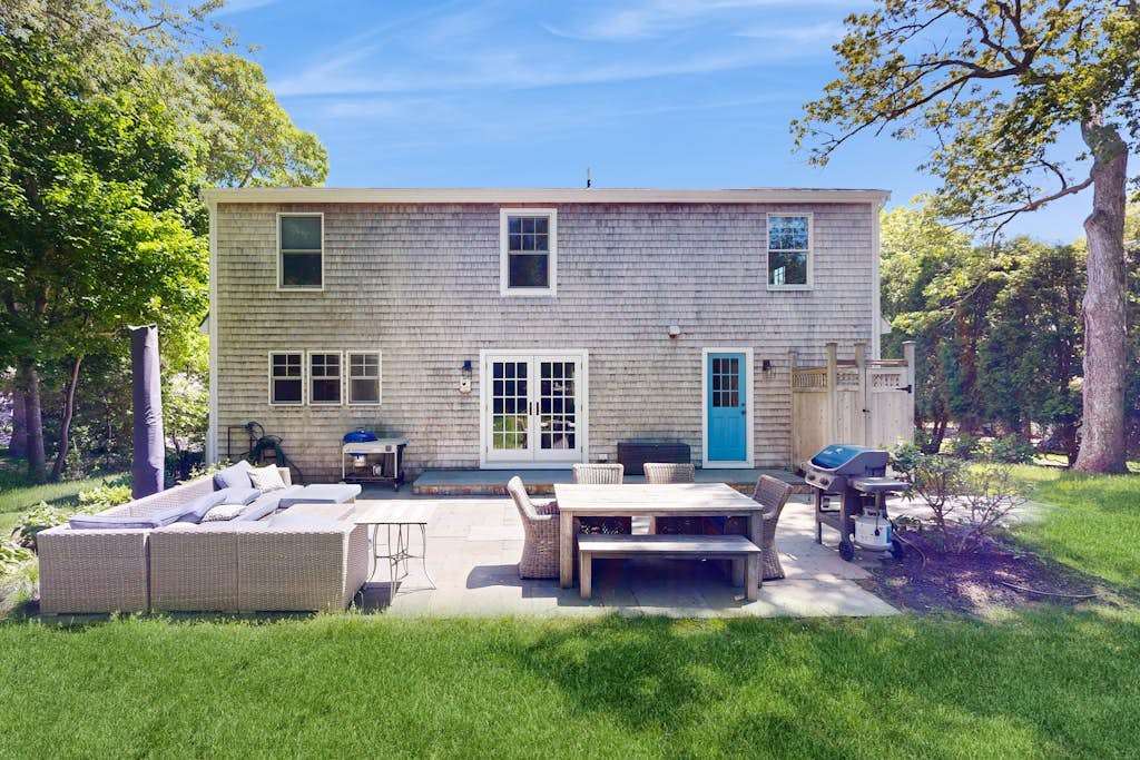 Charming home near downtown & beach with patio, outdoor shower, grill, & W/D