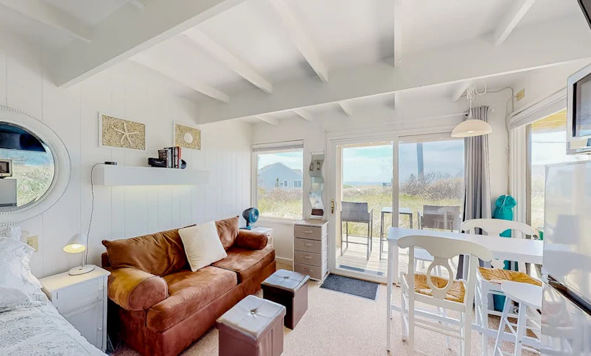 Ocean-view studio near golf with patio, beach gear, kitchenette, & partial AC