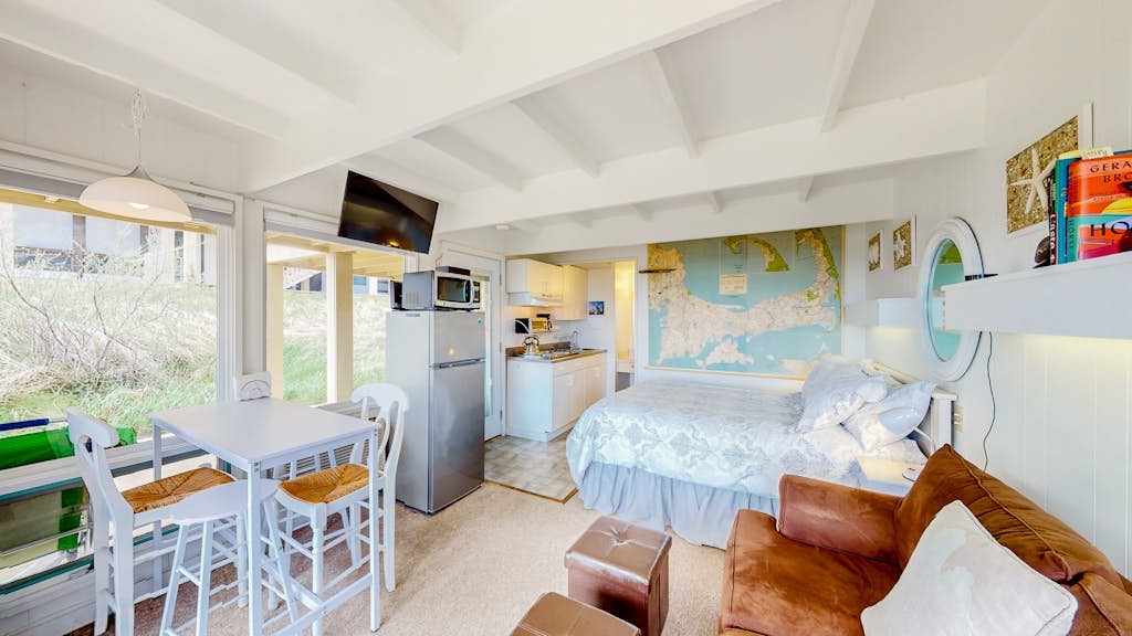 Ocean-view studio near golf with patio, beach gear, kitchenette, & partial AC