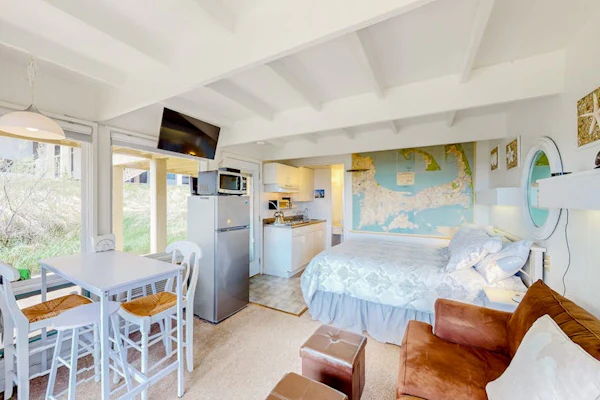 Ocean-view studio near golf with patio, beach gear, kitchenette, & partial AC