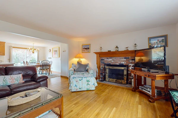 Cozy home close to the beach with deck, porch, W/D, & foosball table