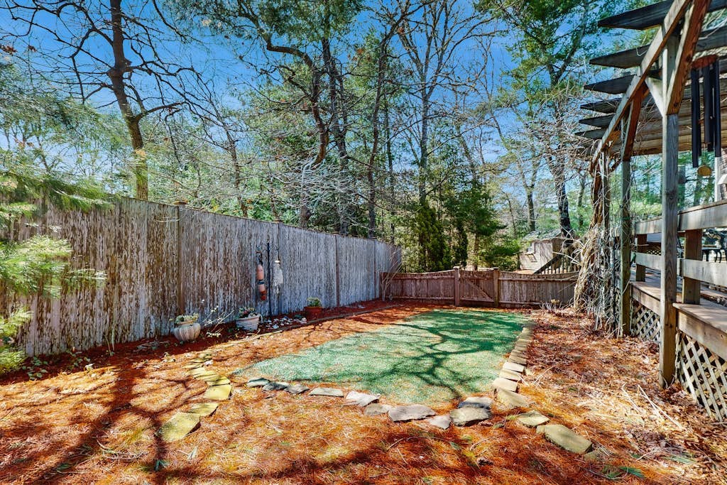 Charming home with open layout, deck, grill, AC, W/D, & yard