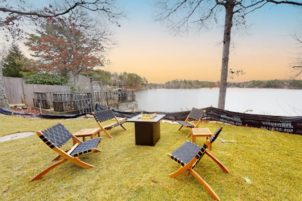 Fantastic lakefront home with firepit, game room, fireplace & W/D, dog-friendly