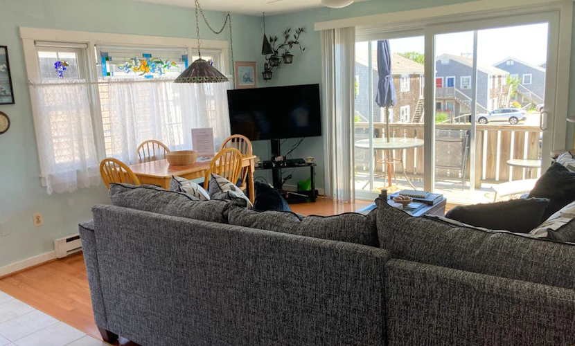 Condo near golf with with ocean views, firepit, balcony, & deck