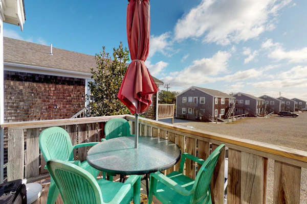 Condo near golf with with ocean views, firepit, balcony, & deck