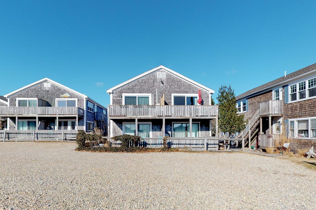 Condo near golf with with ocean views, firepit, balcony, & deck