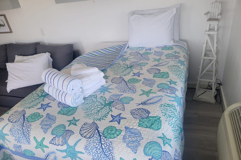 Charming studio steps to beach access with deck, ocean view, kitchenette & grill