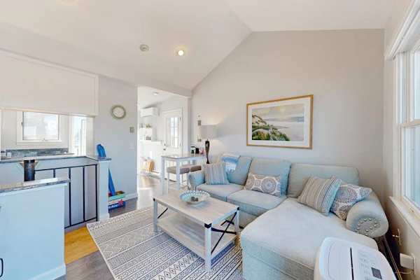 Two-story condo with ocean views, unique setup, parking, & private balcony