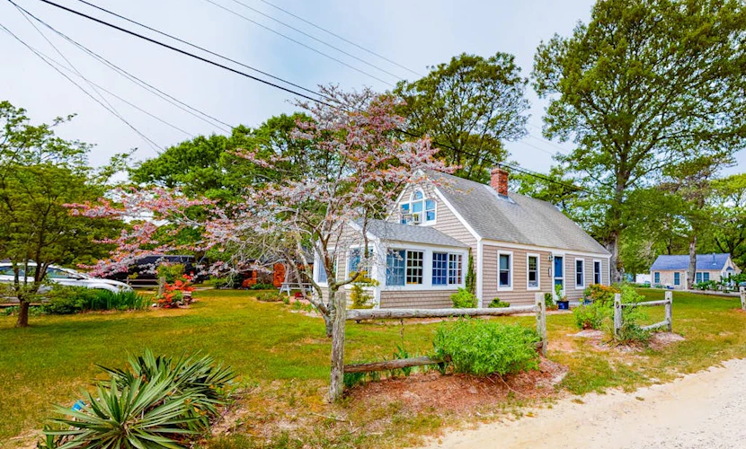 Two-story home with beach access, sunroom, fast WiFi, washer/dryer, & partial AC