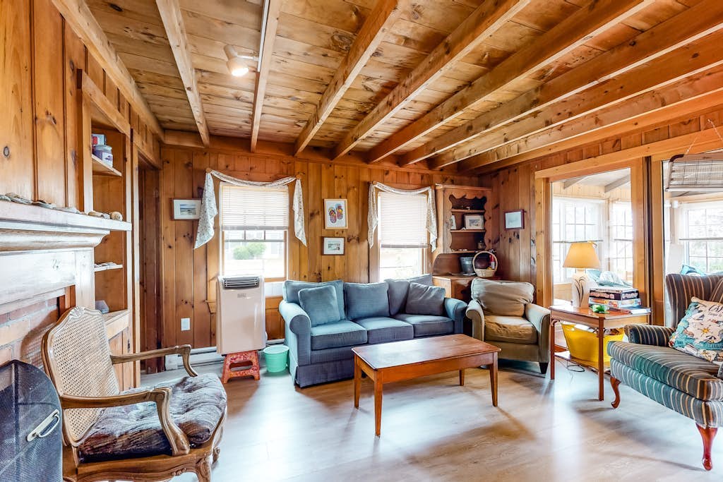 Two-story home with beach access, sunroom, fast WiFi, washer/dryer, & partial AC