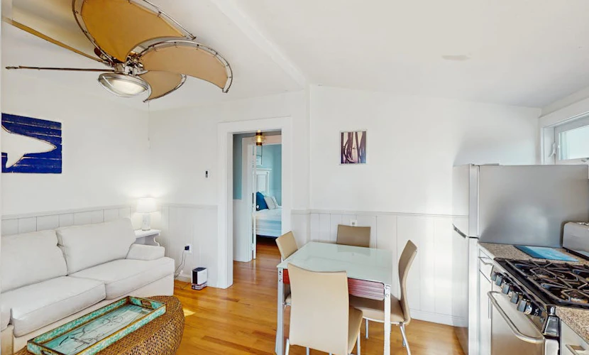 Cozy coastal condo steps from the beach with private deck & two parking spots