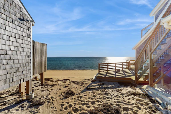 Cozy coastal condo steps from the beach with private deck & two parking spots