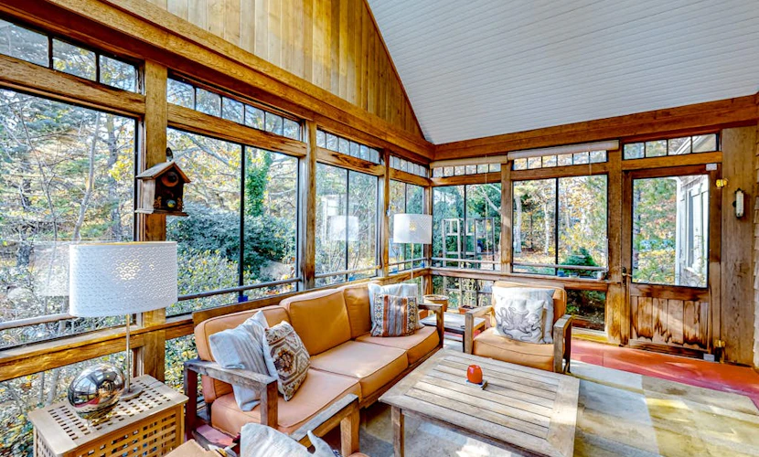 Dog-friendly, hilltop home near the beach with hot tub, firepit & gorgeous porch