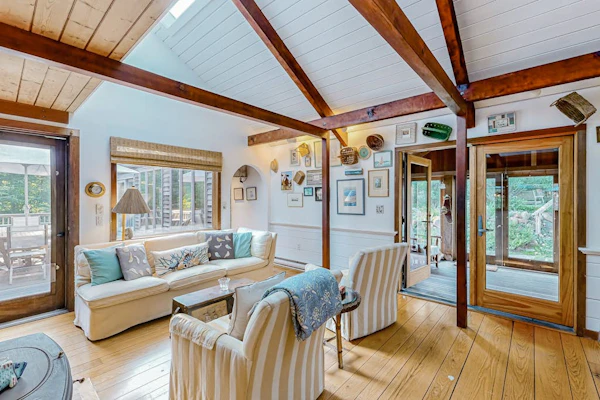 Charming 2-story house near the beach with inviting deck, large yard & canoe