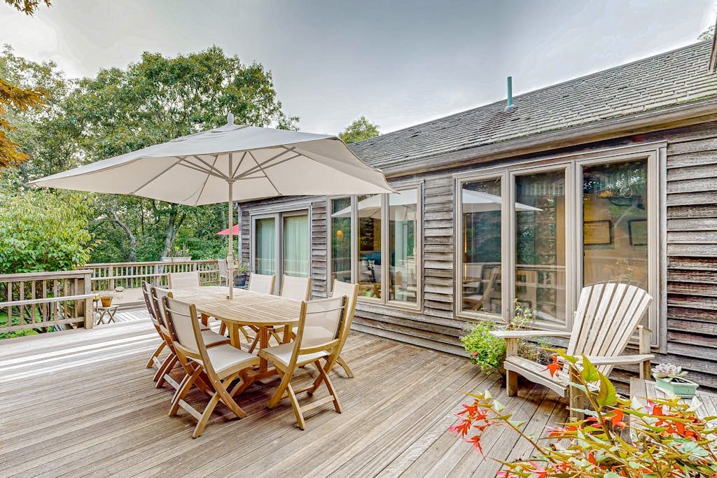 Charming 2-story house near the beach with inviting deck, large yard & canoe