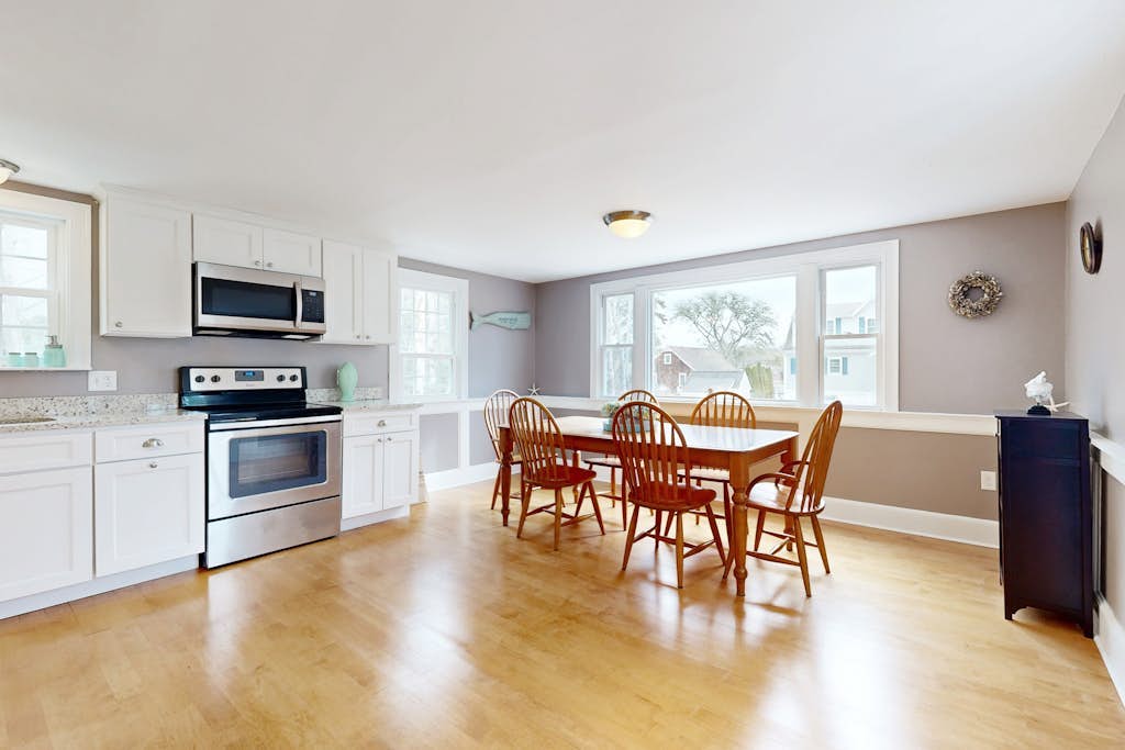 Renovated, river view home with yard games - walk to town dock & beach
