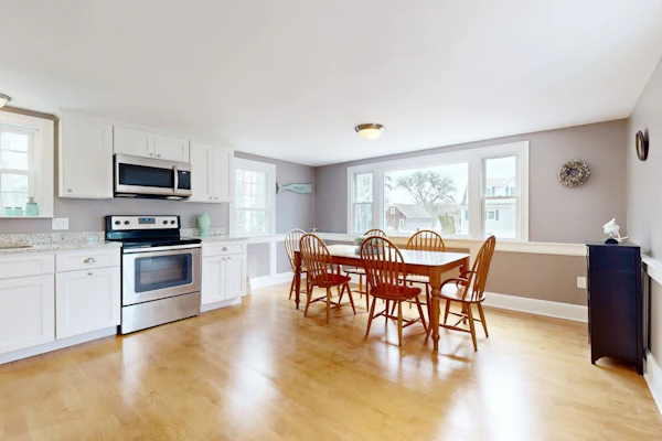 Renovated, river view home with yard games - walk to town dock & beach